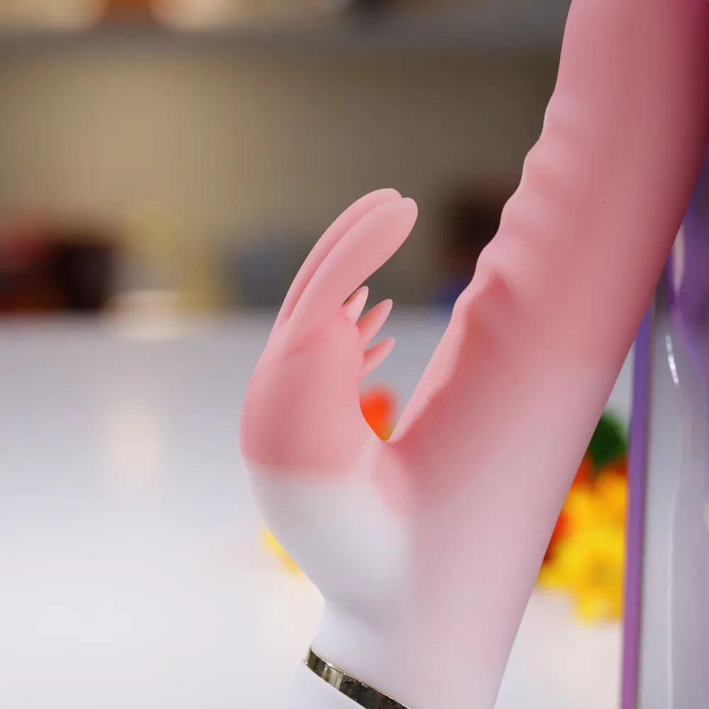 Loving World CT2101 Thrusting & Heating Dual Stimulating — The conveniently placed control button on the handle allows